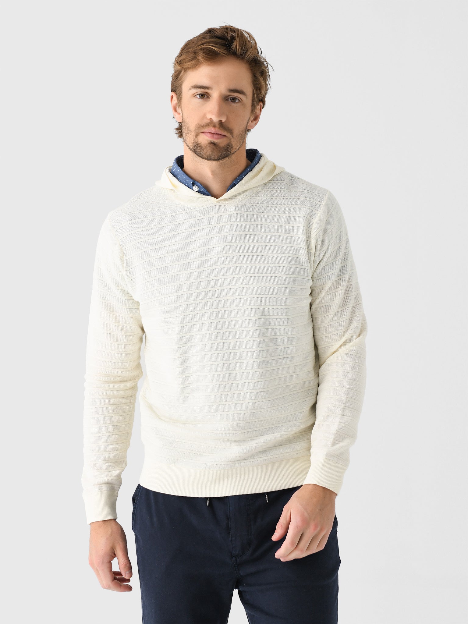 sweater wearing a shirt over a hoodie