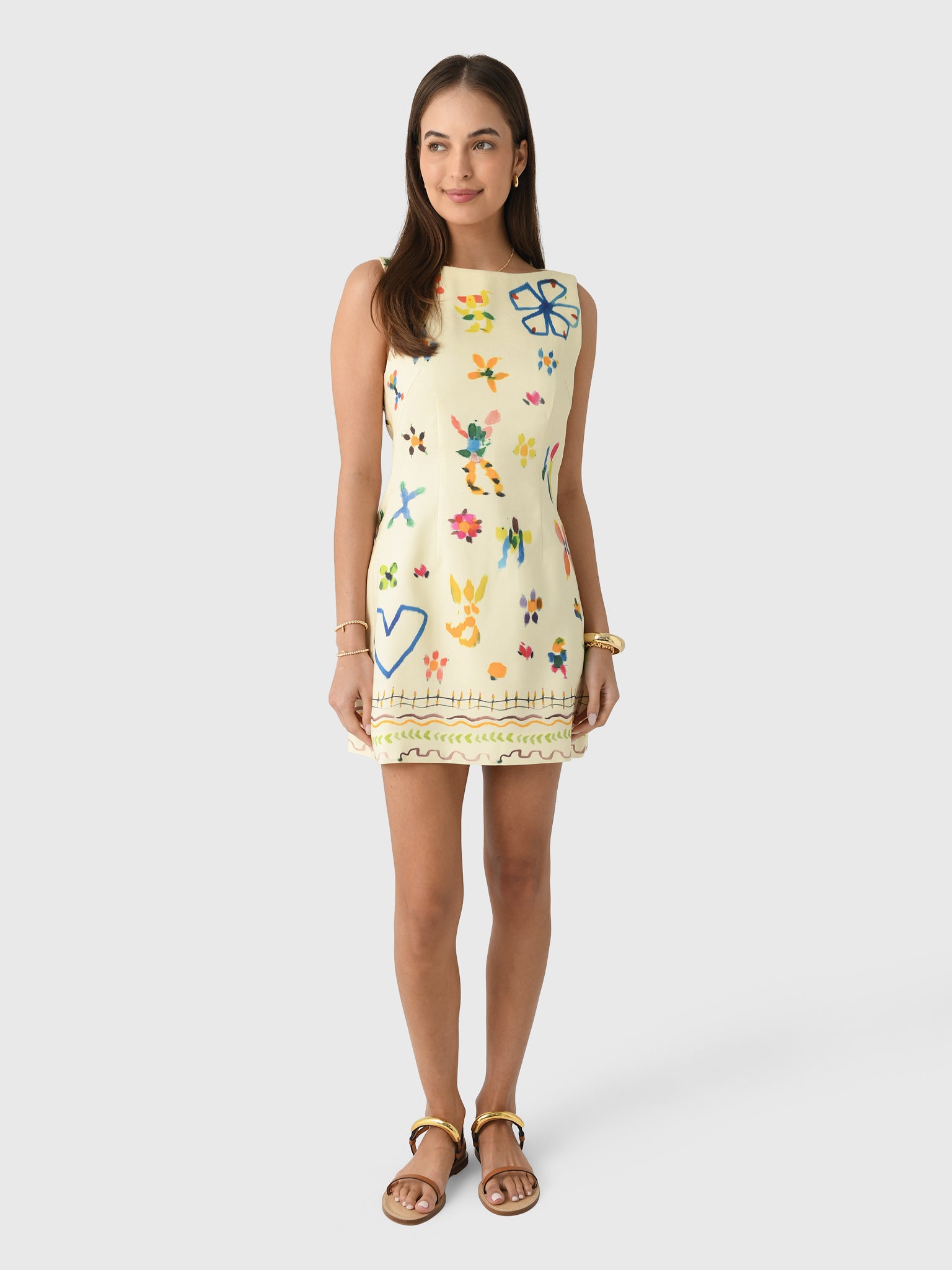 alemais sizzle mini dress This mini isn't about staying put. The Sizzle Mini is made for sun-drenched adventures. Cut in a relaxed silhouette, it's an active summer dress embroidered with shimmering sequined hibiscus that brings a