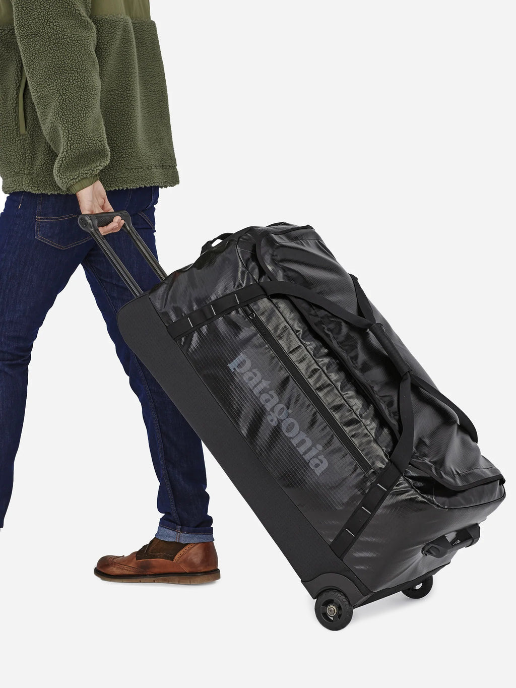 patagonia black hole 120l wheeled duffel bag Jesse Brown's Outdoors the Black Hole Wheeled Duffel will protect your gear from rain and rough handling and still hold everything you need for a wayward journey Patagonia Black Hole 120L Wheeled